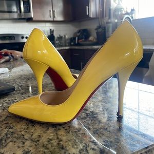 Christian Louboutin yellow stilettos 38.5 (fits a 7.5)